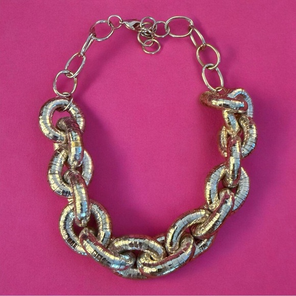 Sequin Jewelry - Bold, silver-toned piece is a chunky articulated link statement necklace.